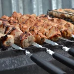 Shashlik lamb skewers on mangal grill