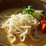 Kelantan-Style Thick Rice Noodles with Fish Coconut Broth