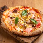 Roman-Style Pizza with Ham, Mushrooms, Artichokes, Olives