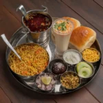 Gujarat-Style Tomato Curry with Crispy Chickpea Noodles