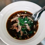 Thai Wide Rice Noodles in Savory Gravy